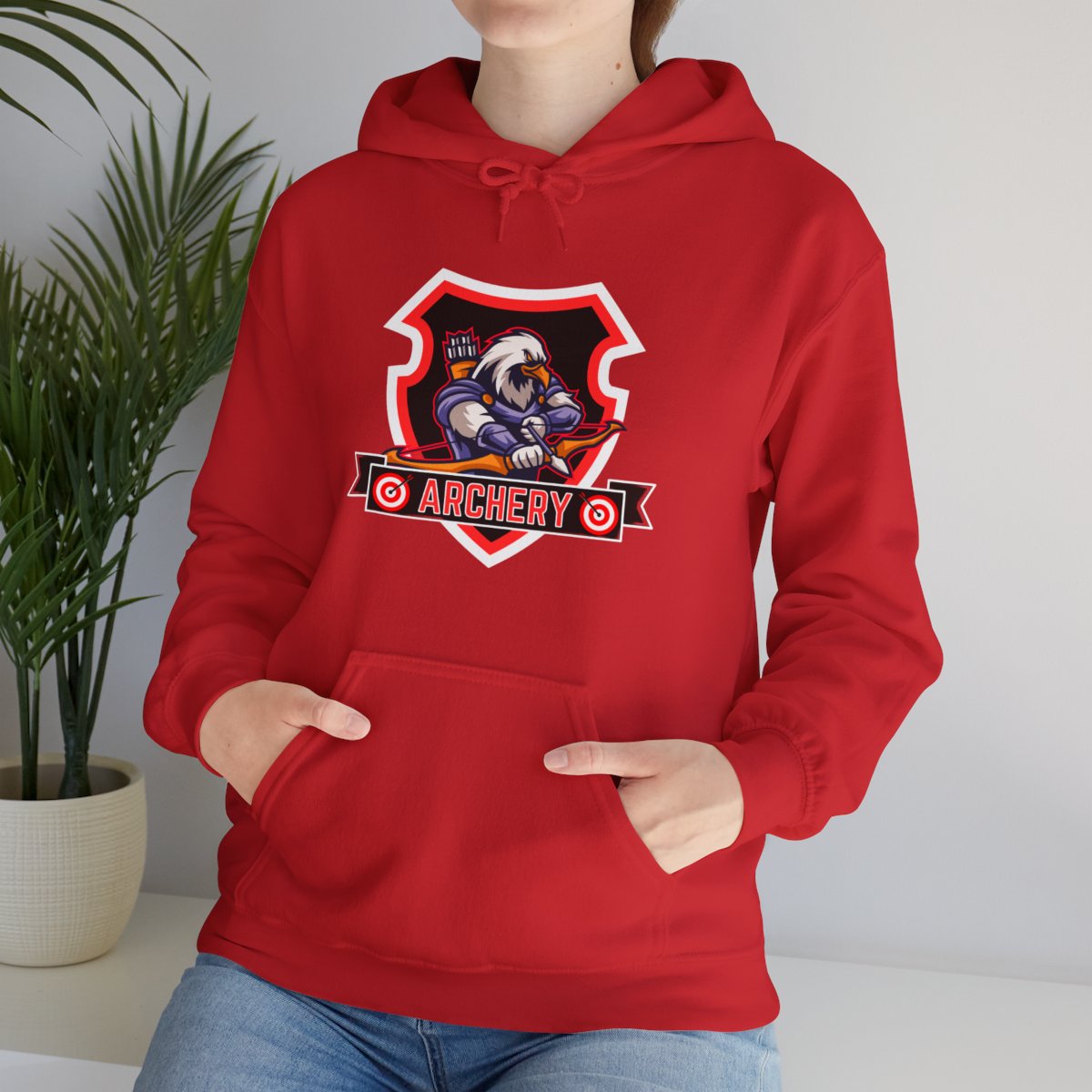 Lifestyle image of woman wearing archer eagle hoodie casually
