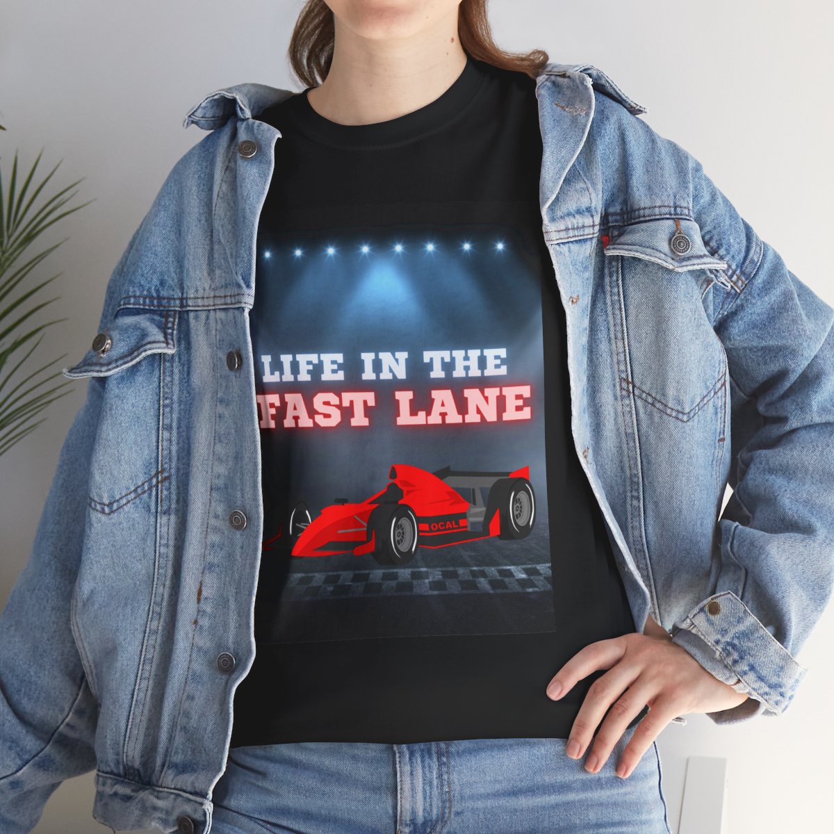 Lifestyle image of woman modeling race car kids t-shirt in casual setting