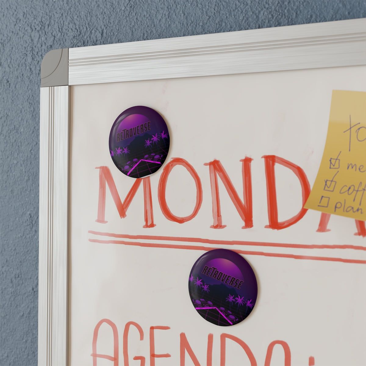 Retro 80s Button Magnet Sticker on a white board, adding colorful synthwave flair to the room
