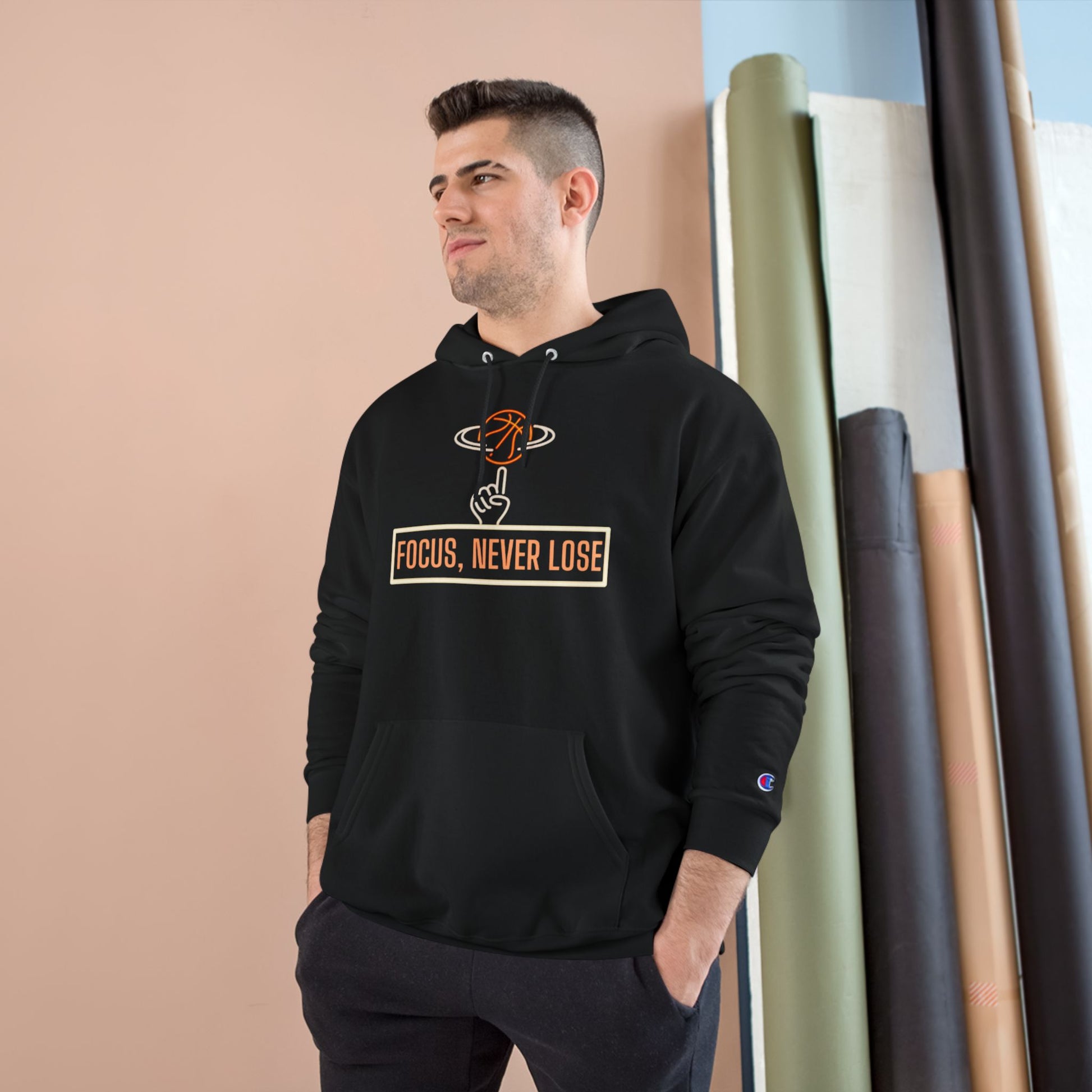 Man wearing Neon Basketball Champion Hoodie with Focus Never Lose print and neon green accents outdoors.