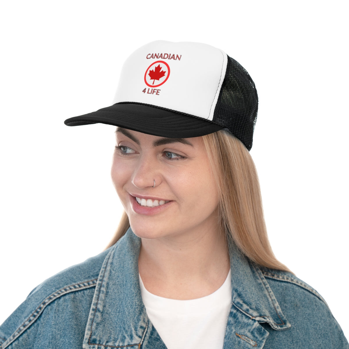 Person wearing Canada Day trucker cap featuring red maple leaf and patriotic design