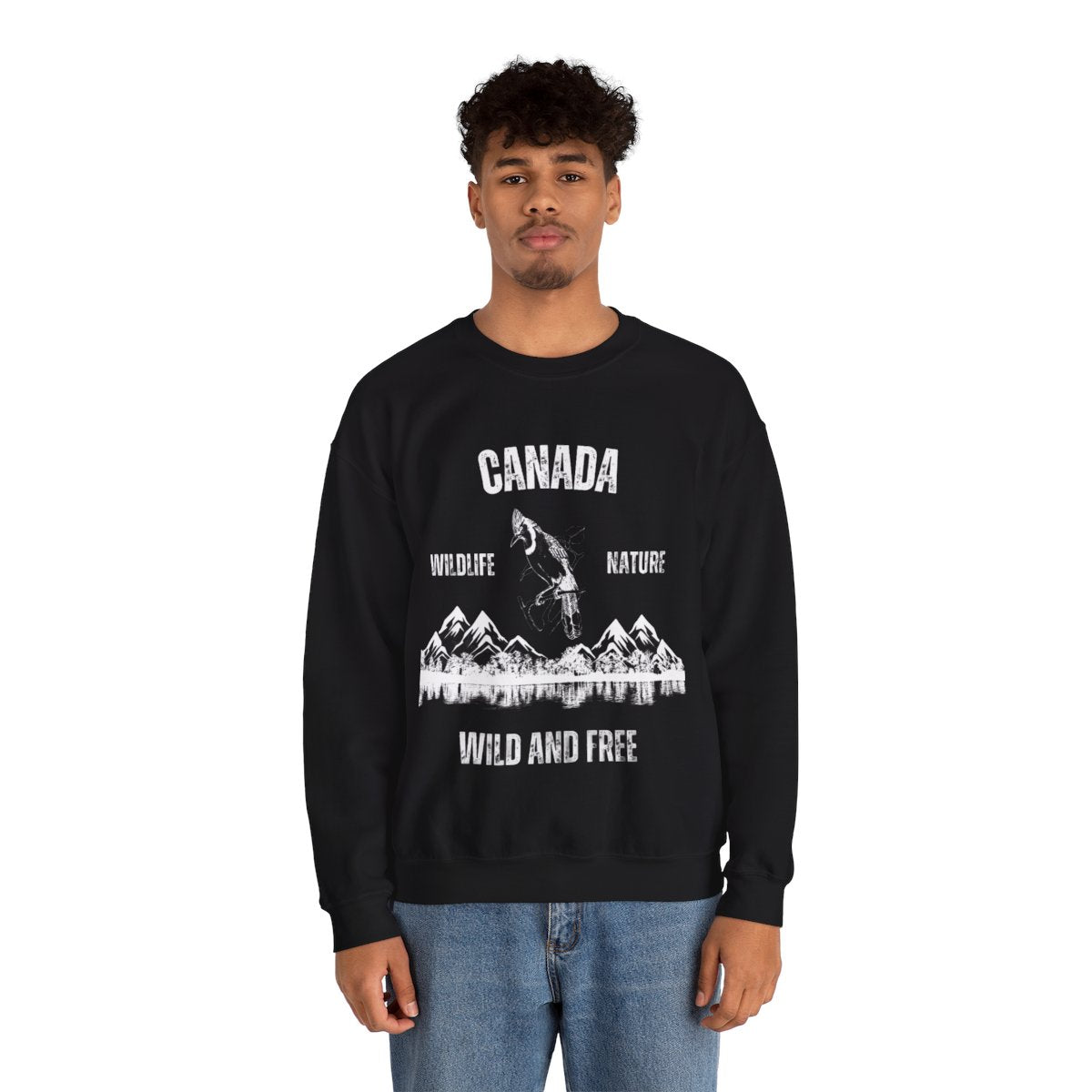 Man modeling Canadian Wildlife Nature Wild and Free Sweatshirt in a nature-inspired outfit