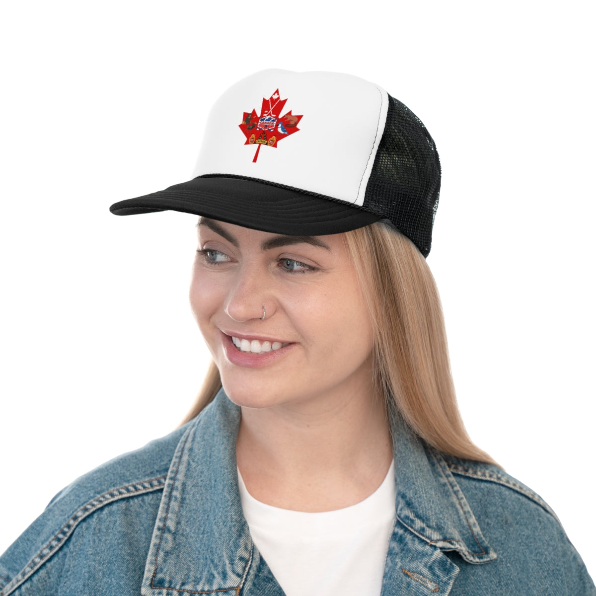 Person wearing winter maple leaf trucker cap outdoors during cold season