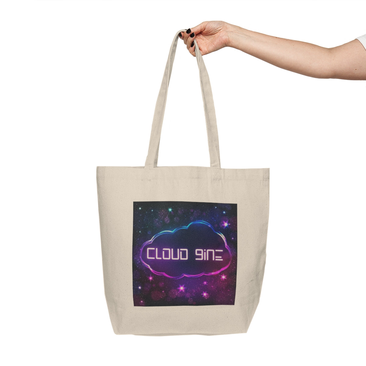 Neon cloud shopping tote held by person showing front colorful design