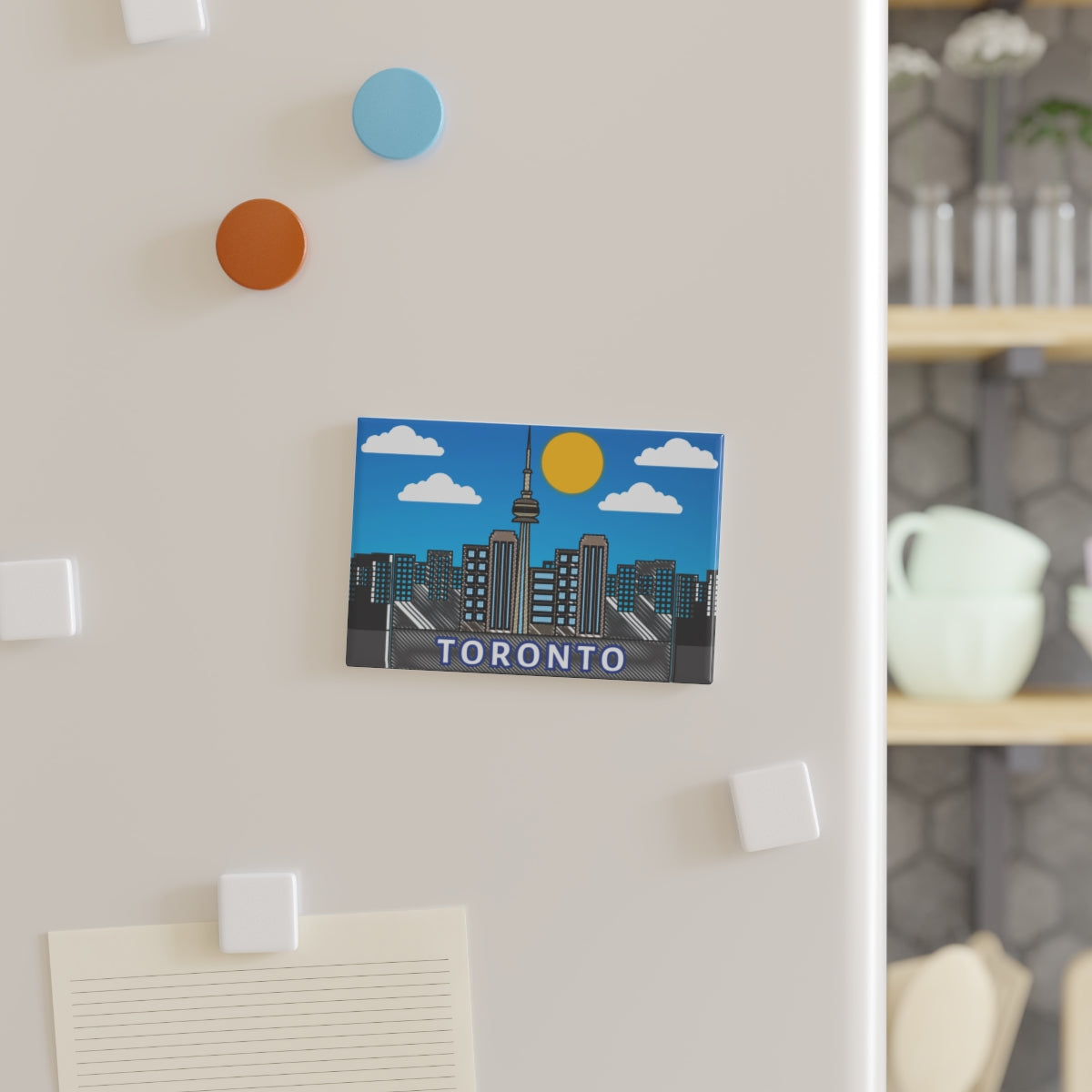 City Scene Magnet attached to refrigerator door in kitchen setting