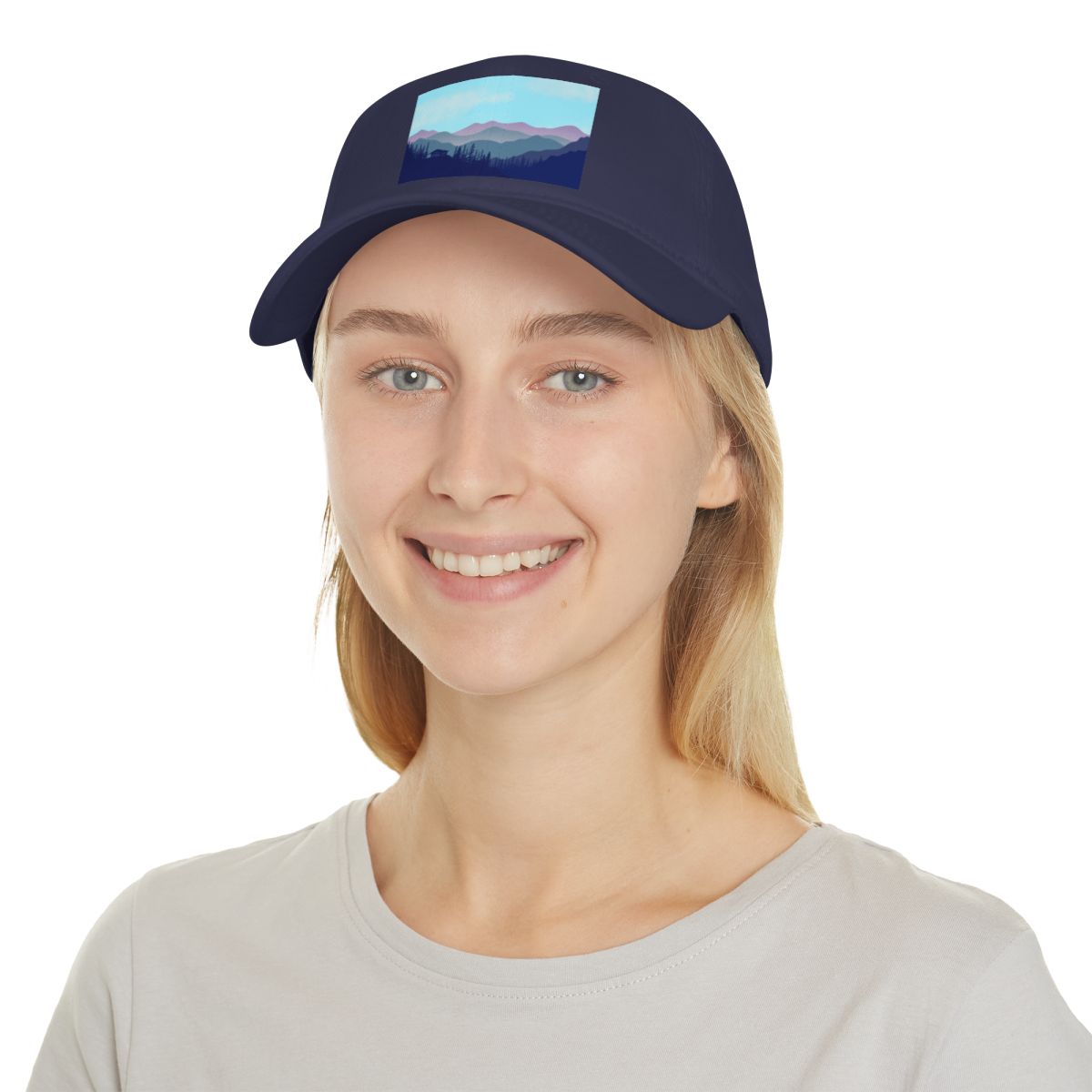 Person wearing Navy Blue Mountain Landscape Cabin Cap outside
