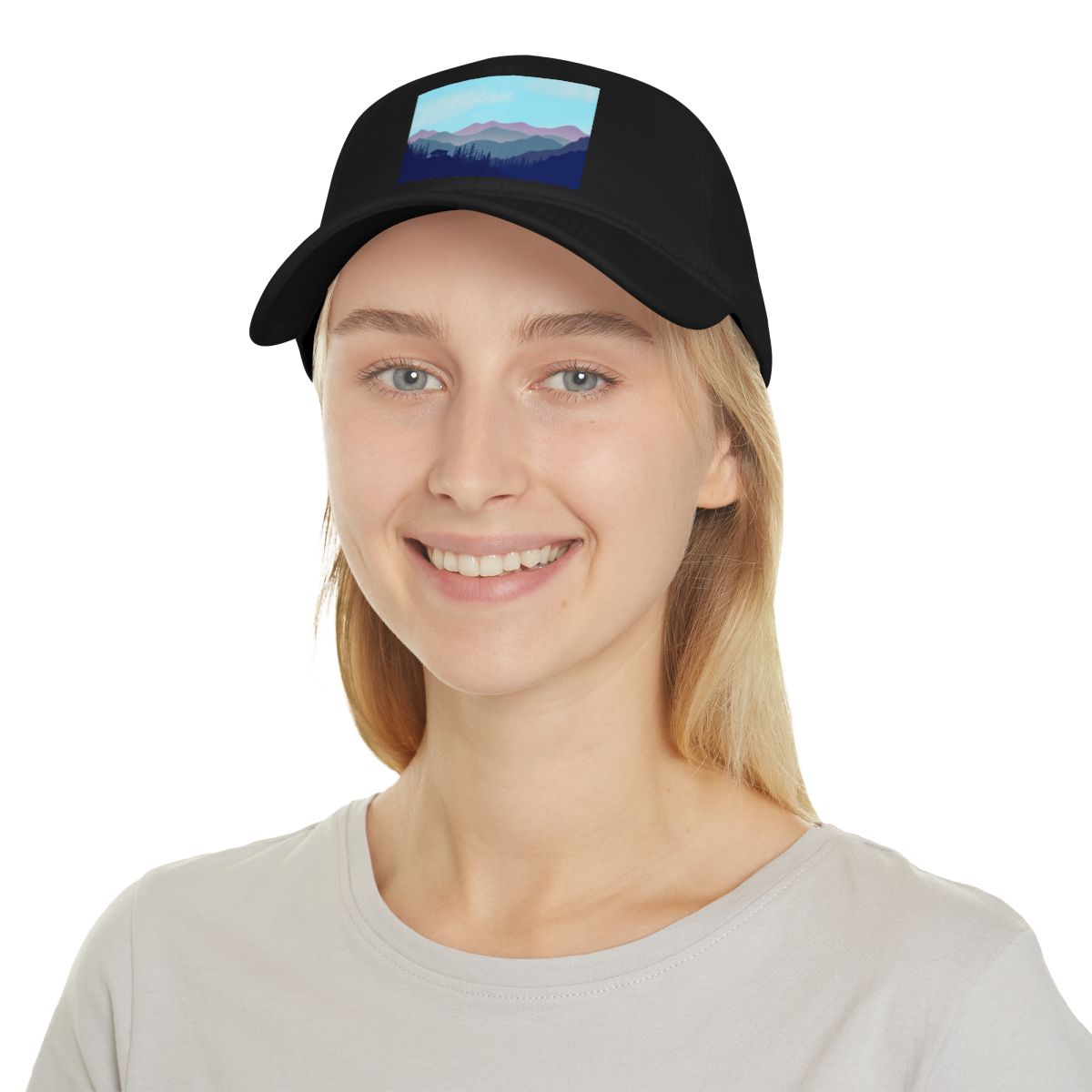 Person wearing Black Mountain Landscape Cabin Cap outdoors